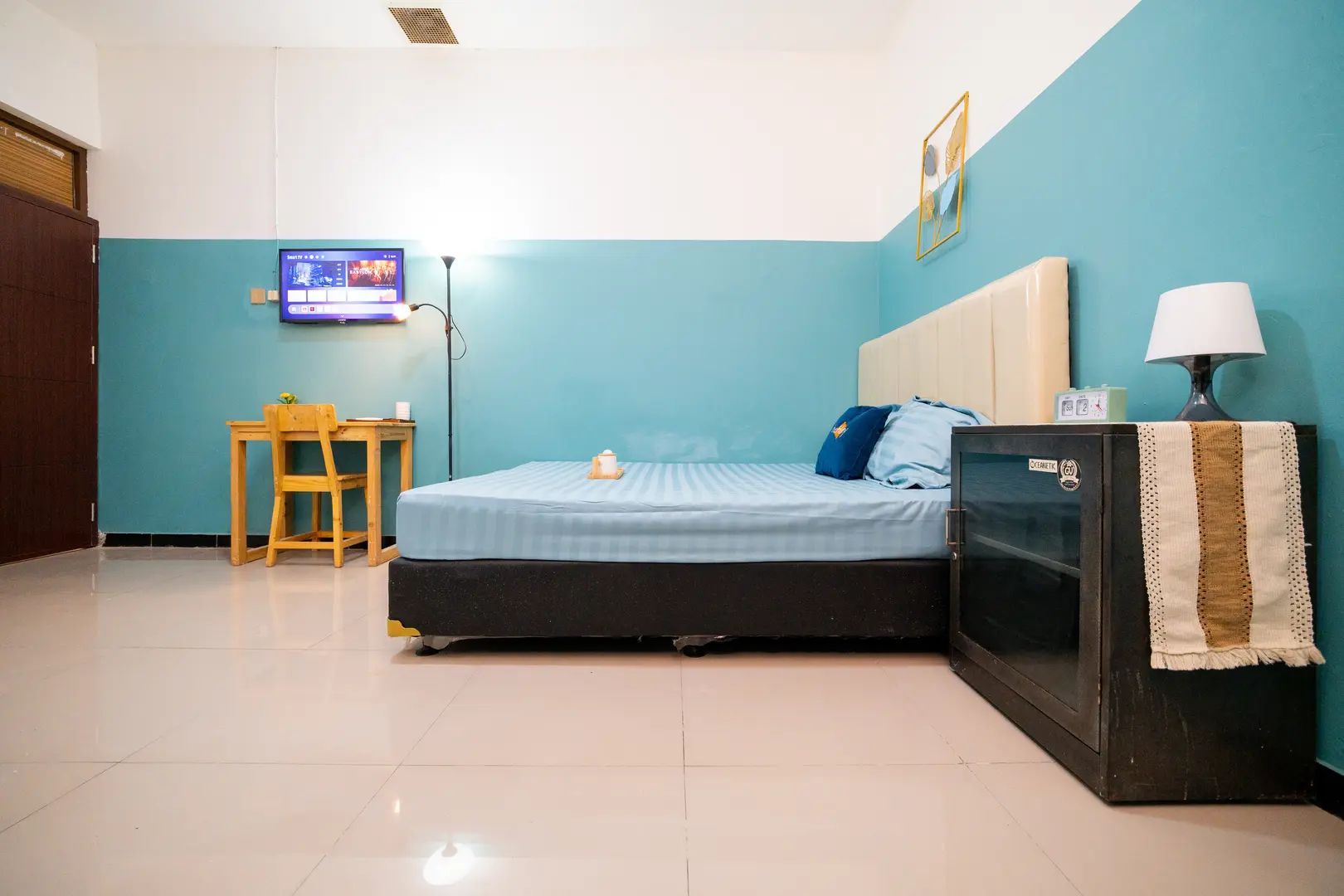 foto kamar Tipe Deluxe properti Behomy Yume Grogol