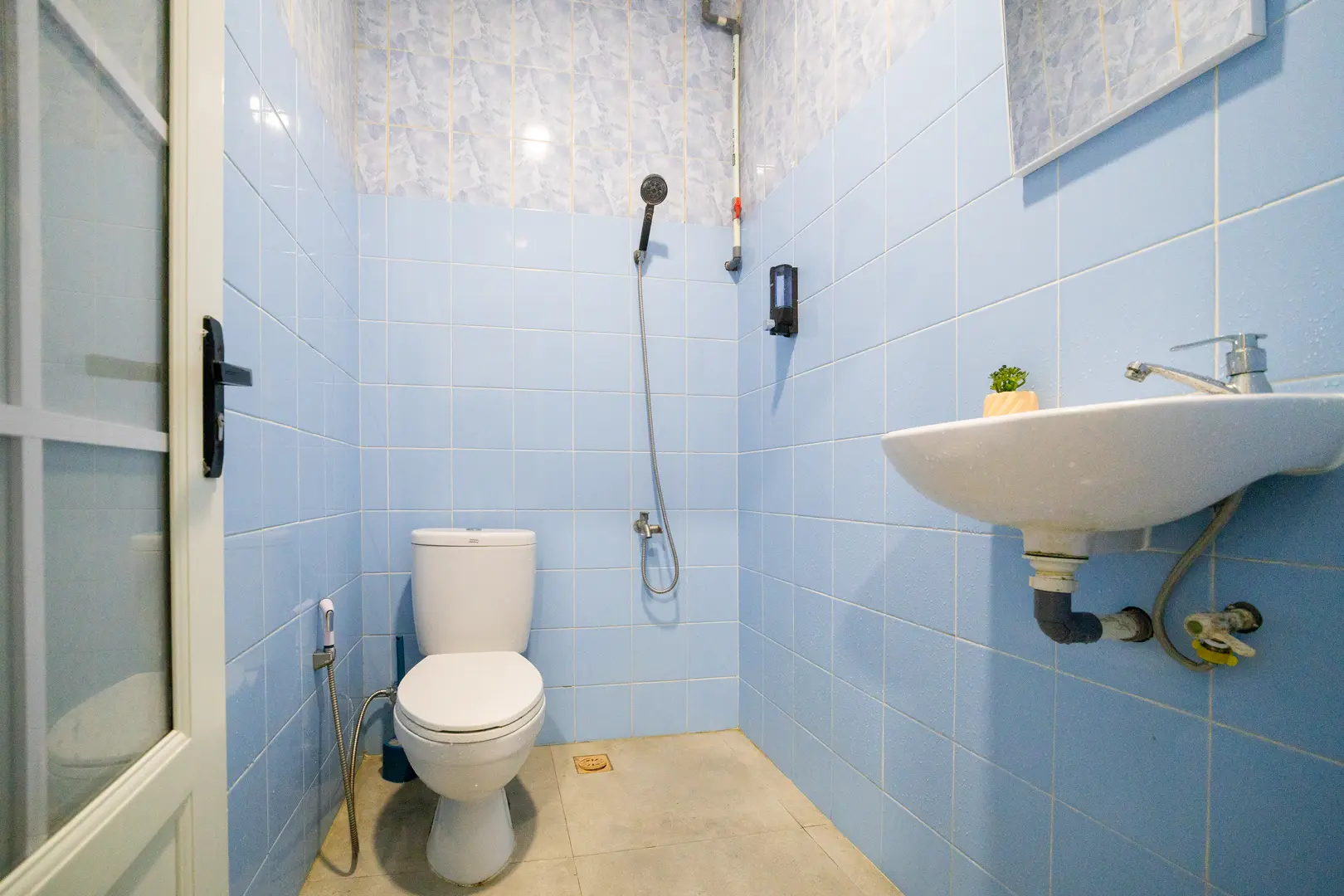 foto kamar Tipe Deluxe properti Behomy Yume Grogol